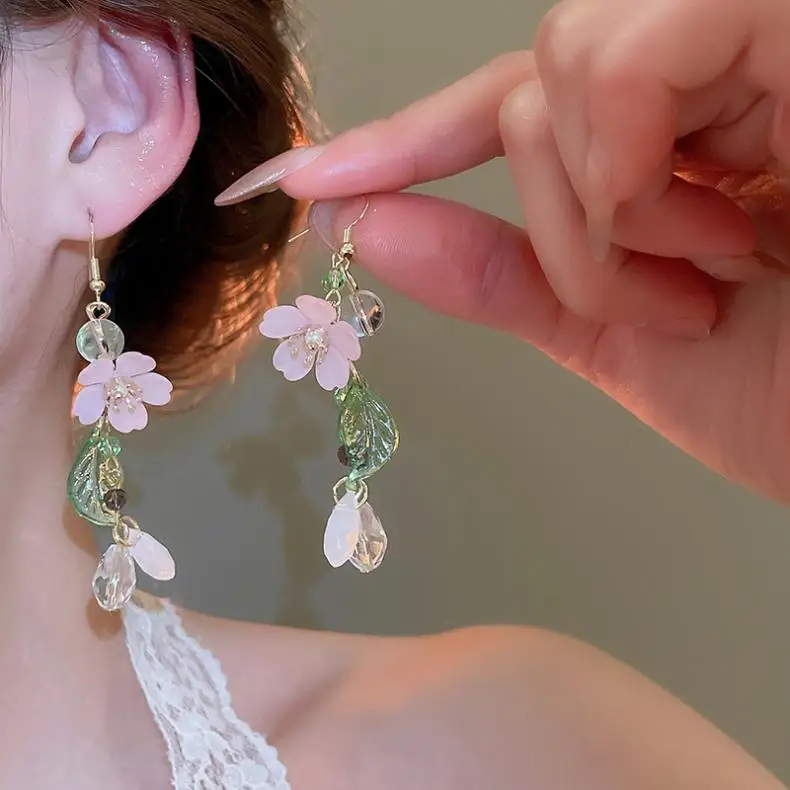 Sa44342ead5194f549a2601edeff8d33aD Elegant White Orchid Flower Earring for Women Ladies Temperament Metal Leaves Long Tassel Drop Earrings Hook Jewelry Accessories Mallzona