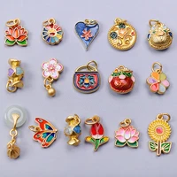 10 pièces alliage huile dégoulinant plaqué or émail pendentifs fleur sourire Lotus papillon charme bijoux à bricoler soi-même faisant collier Bracelets 6
