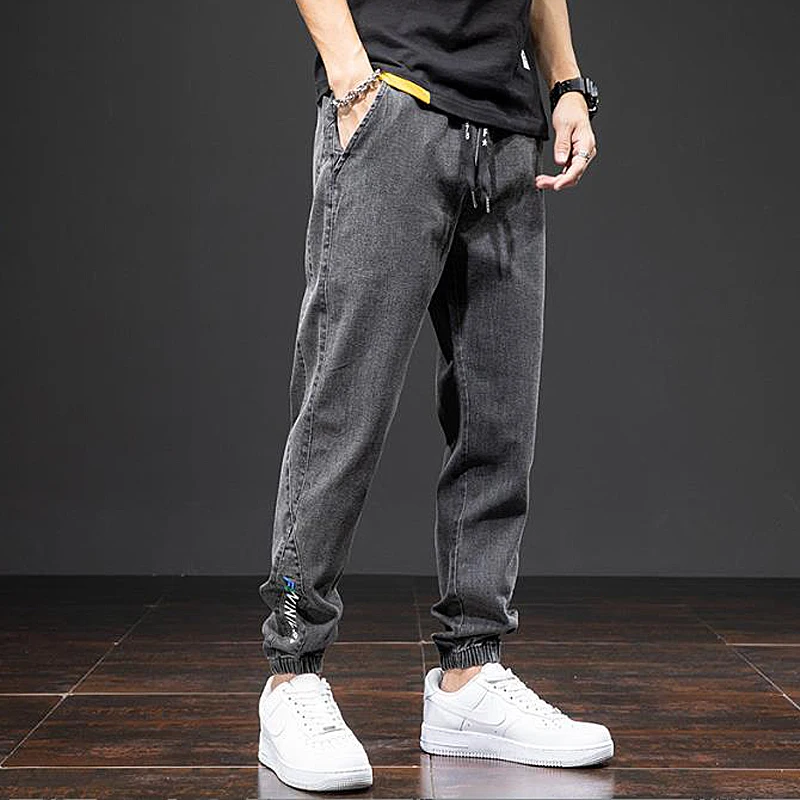 Large size elastic workwear men's ankle tied Harlan denim pants denim trousers cargo jeans wear-resistant and fat added plus size trendy and loose