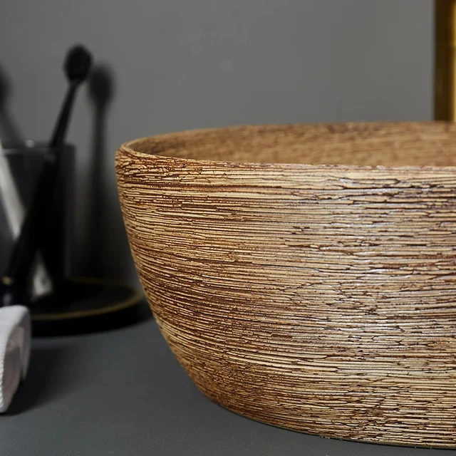 อ่างล้างหน้าเซรามิคอ่างล้างจานเคาน์เตอร์อ่างล้างหน้ารูปไข่ซักผ้าห้องน้ําอ่างล้างจาน GN679TB 3