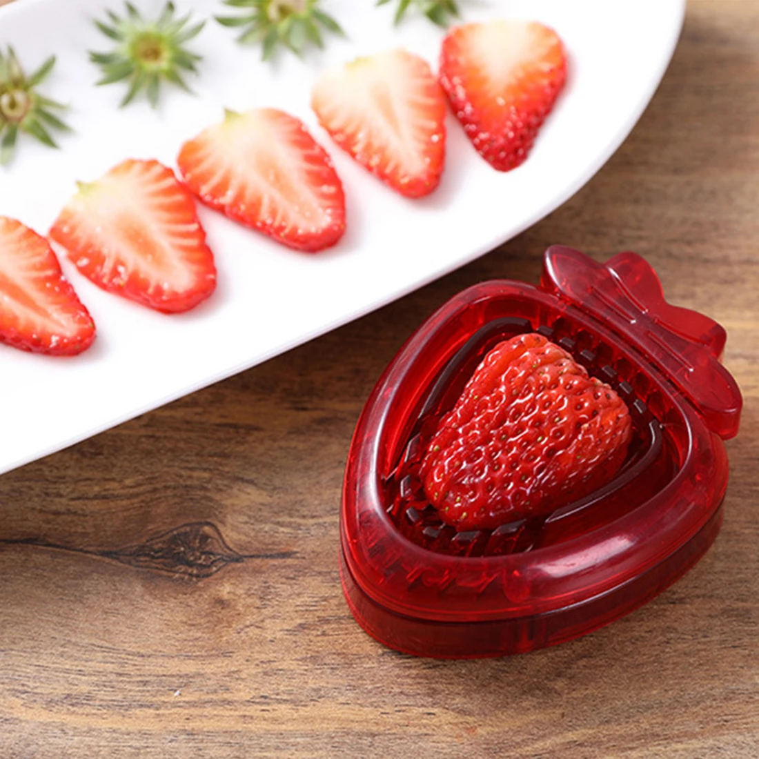 https://ae01.alicdn.com/kf/Sa4af962986034343a0653057848a1209P/Strawberry-Slicer-Fruit-Cutter-Carving-Tool-Salad-Cutter-Stainless-Steel-Strawberry-Cutter-Fruit-Slicer-Portable-Kitchen.jpg