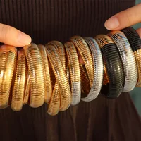 18K PVD Gold Plated Spring Antique Original Design Wide and Narrow Style Elastic  stainless Steel Bracelet Jewelry for women 1