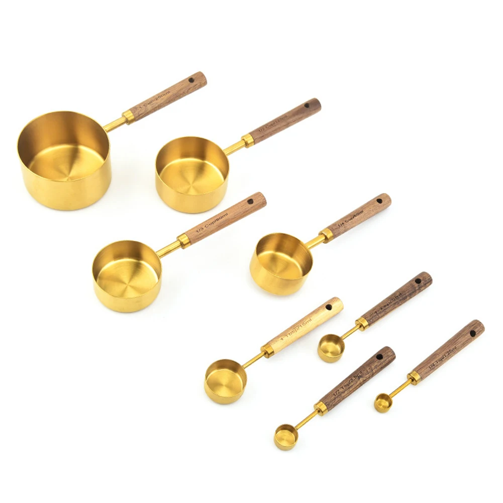 https://ae01.alicdn.com/kf/Sa4bd014dcb3b407bb0df394e8e80ae3de/Kitchen-Measure-Cup-Spoon-Set-with-Wooden-Handle-Nesting-Metal-Measuring-Cups-Set-Stainless-Steel-Gold.jpg