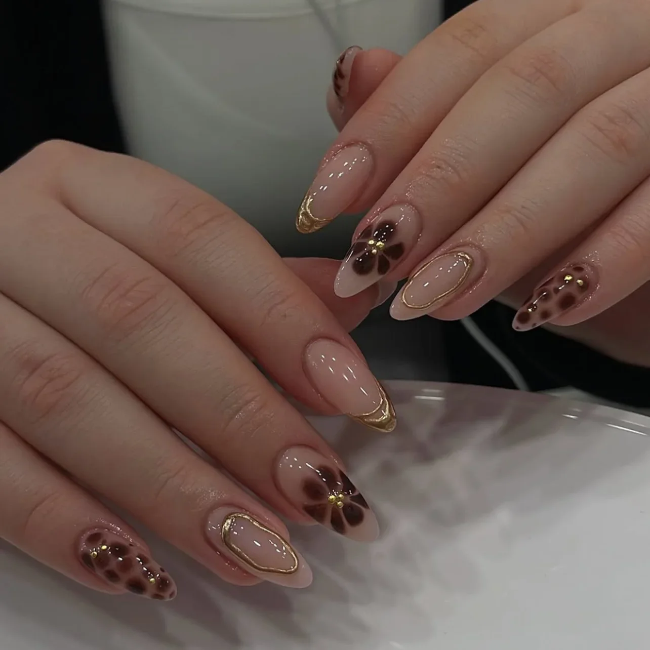 Elegant Maroon Nails with Gold Veins