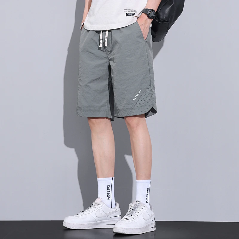 Fashion Elastic Spliced Printing Letter Casual Shorts Men's Clothing 2024 Summer New Loose Solid Color All-match Knee Shorts