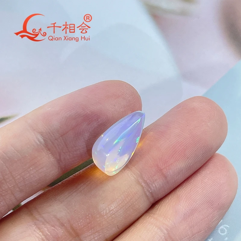 4-7ct pear-shaped natural white opal cabochon, colorful, certified, perfect for unique jewelry designs.