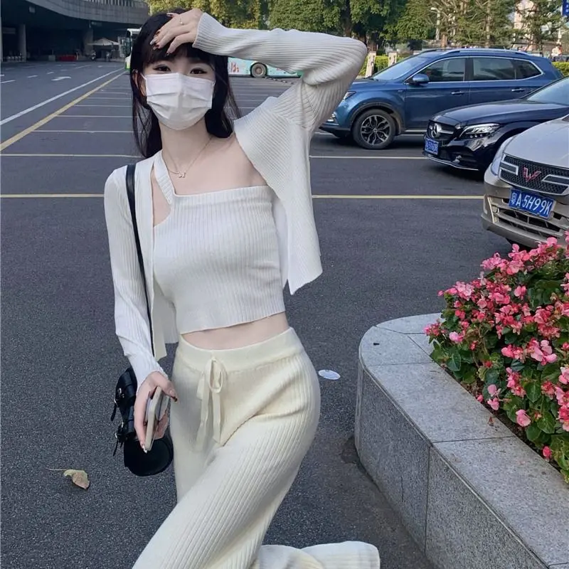 

Hot girl style spring and summer two-piece women irregular camisole short section loose style knitted cardigan fashion sets