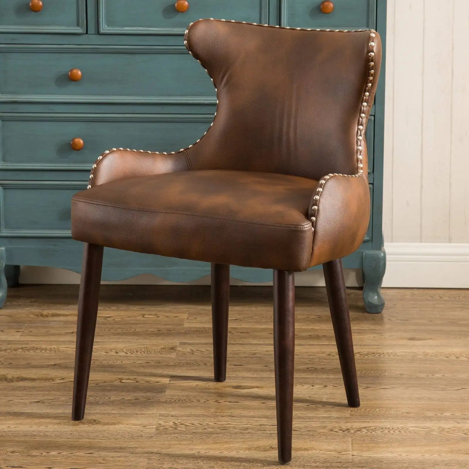 

Viking Tufted Button Back chair with Nailhead in Brown