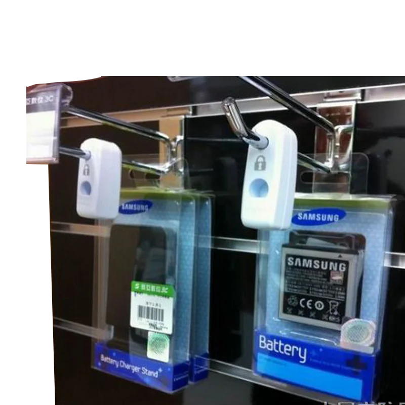 100x Against shoplifting plastic EAS hook stop lock catch for anti theft sweep display in retail shop +1 magnetic lockpick key