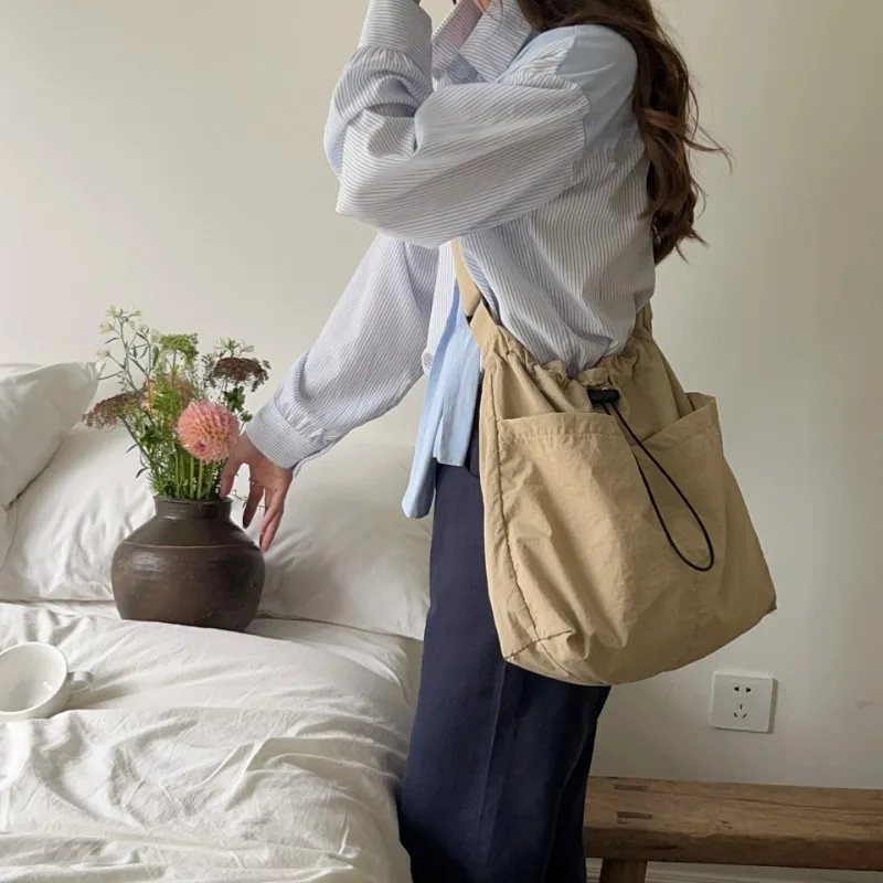Korean nylon fabric casual drawstring, lazy and versatile oversized capacity single shoulder diagonal cross bag for women