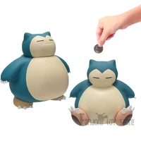 Pokemon Snorlax salvadanaio 2 pose seduto e in piedi 16cm 1