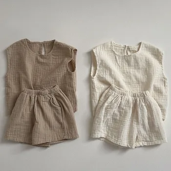 Set di abbigliamento per bambini 2025 Nuovo abito estivo da ragazzo Comodo top in tinta unita + abito corto casual in due pezzi.