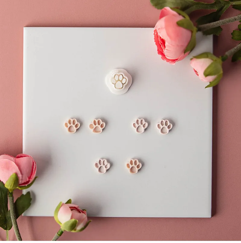 Description Picture 2 of itemCute Cartoon Paw Print Clay Cutter Animal Dog Cat Paw Print Polymer Clay Embossing Cutter for Clay Earring Jewelry Molds Tools