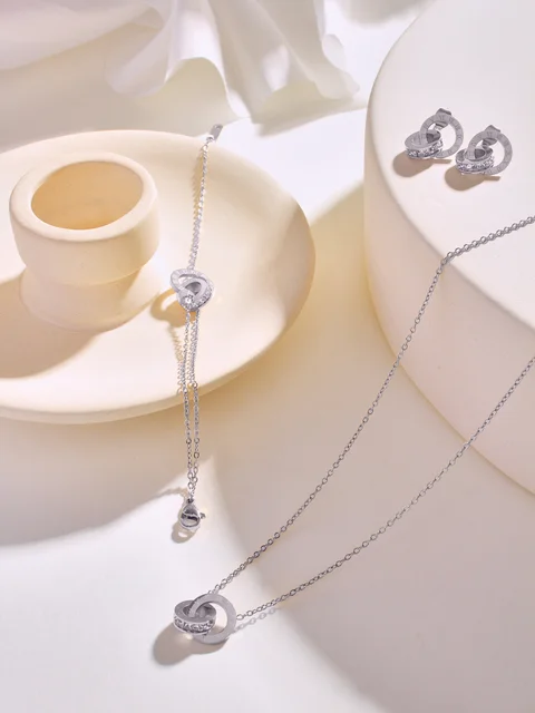 الفولاذ المقاوم للصدأ 18K مطلية بالذهب الدوائر المتشابكة مجموعة مجوهرات ، قلادة طوق ، سوار ، أقراط ، الأرقام الرومانية ، نمط إنفينيتي