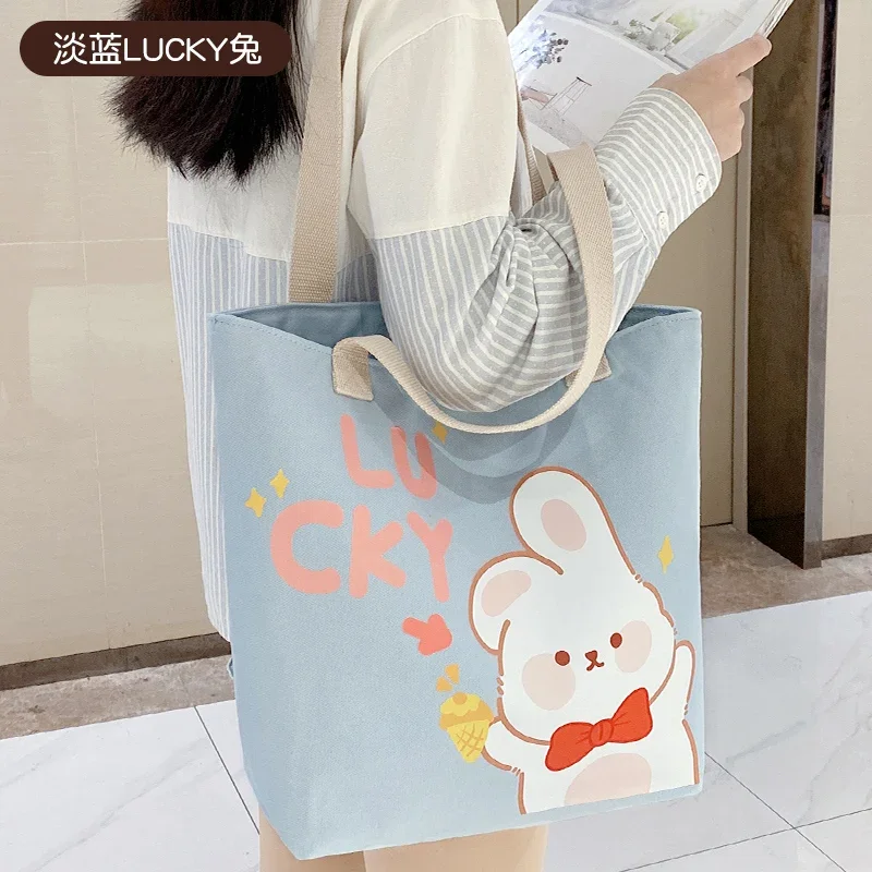 

Canvas bag women's 2023 new hand-held cloth bag large capacity book bag junior high school student tutoring autumn and winter sh