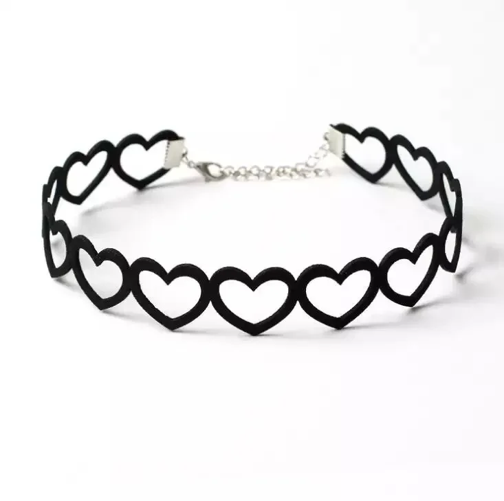 A Gothic Velvet Choker Necklace for Women with hearts on it.