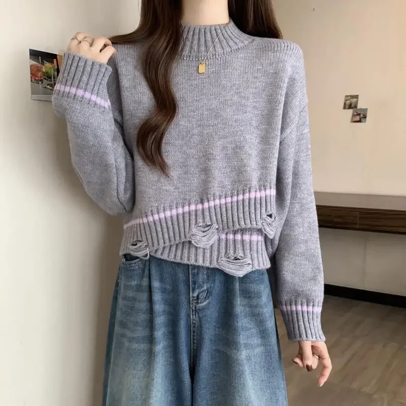 

Fake twopiece short jumper women's models autumn and winter new loose outside worn broken holes longsleeved knitted sweater tops