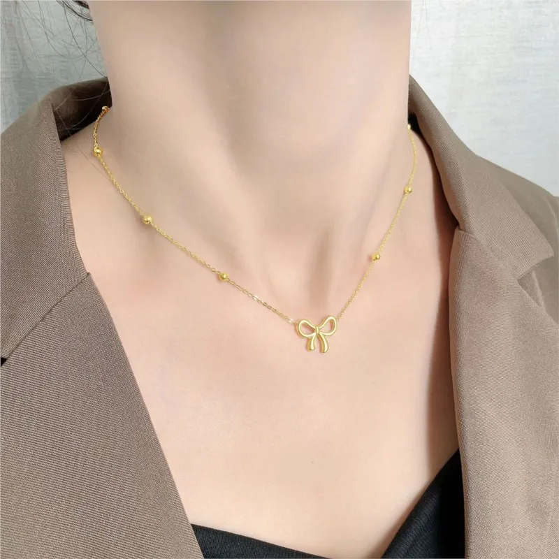 Anenjery l316 Stainless Steel Beaded Chain Hollow Bowknot Pendant Necklace for Women Niche Simple Jewelry Accessories_voghion.com