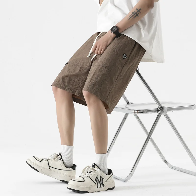 Large size casual shorts, quick drying and breathable capris, men's large size loose trendy casual sports ice silk pants