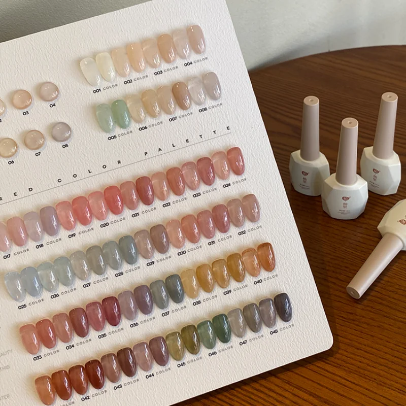 

Four Styles Solid Color Iced Tea Jade 48Colors Nail Art Design Popular Nail Salon Ultraviolet Gel LED Semi Permanent Gel Nail