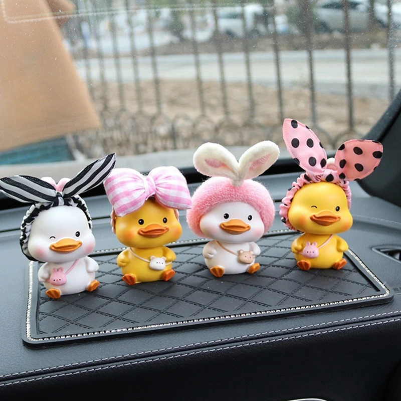 

1Pc Car Ornaments Cute Resin Bow Headband Duck Shaking His Head Doll Car Cartoon Auto Interior Supplies Accessories