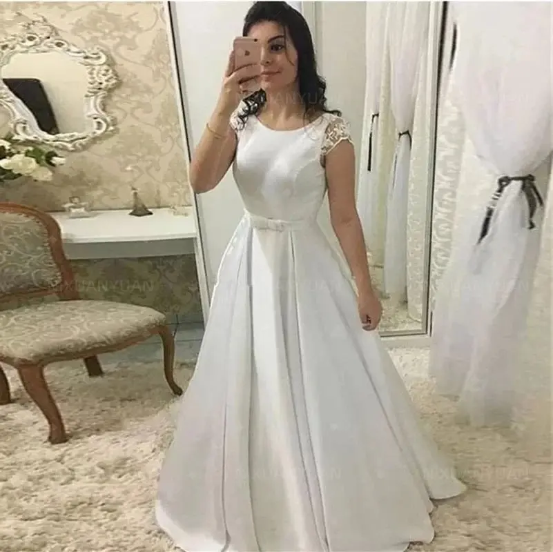 

Свадебное платье с открытой спиной и круглым вырезом