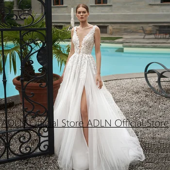 Abiti da sposa Boho Abito da sposa personalizzato Profondo scollo a V senza maniche Perline Applique Tulle A Line Beach Sposa Vestido Novia