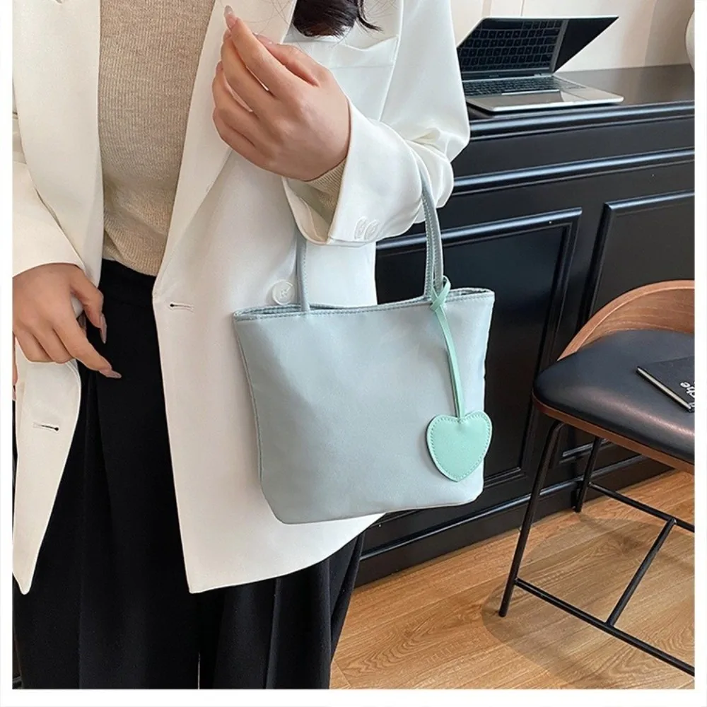 Neue Macaron-Farbene Mini-Tragetasche Leichte Mini-Schultertasche Vielseitiges Design Nylon-Handtasche für Damen – Detail 11