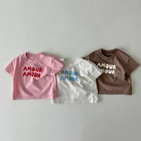 Enfants été mode lettres imprimer t-shirts bébé garçons solide T-Shirt enfants blanc haut en coton vêtements filles t-shirt style décontracté 2-7 ans 1