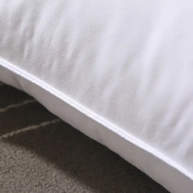 편안함과 스타일을 결합한 고급스러운 구스 다운 베개 세트