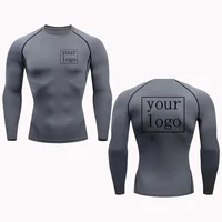 Les hommes et les femmes conviennent à la personnalisation du jogging, de l'entraînement et de la salle de sport des T-shirts ajustés avec des logos de conception et des originaux 6