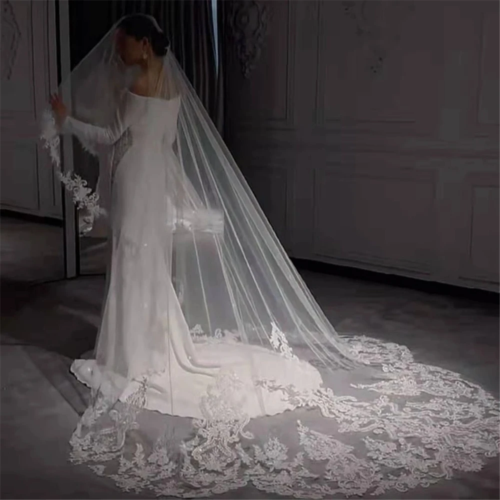 https://ae01.alicdn.com/kf/Sa6418d510afd48df8524eba94c2a91658/1-Tier-Bridal-Veil-Ivory-White-Cathedral-Mantilla-Wedding-Veil-Long-Floral-Embroidery-Veil-Soft-Tulle.jpg