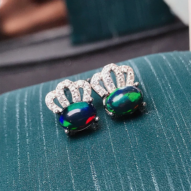 Anello in oro bianco con opale boulder e rubini | Virano Gioielli