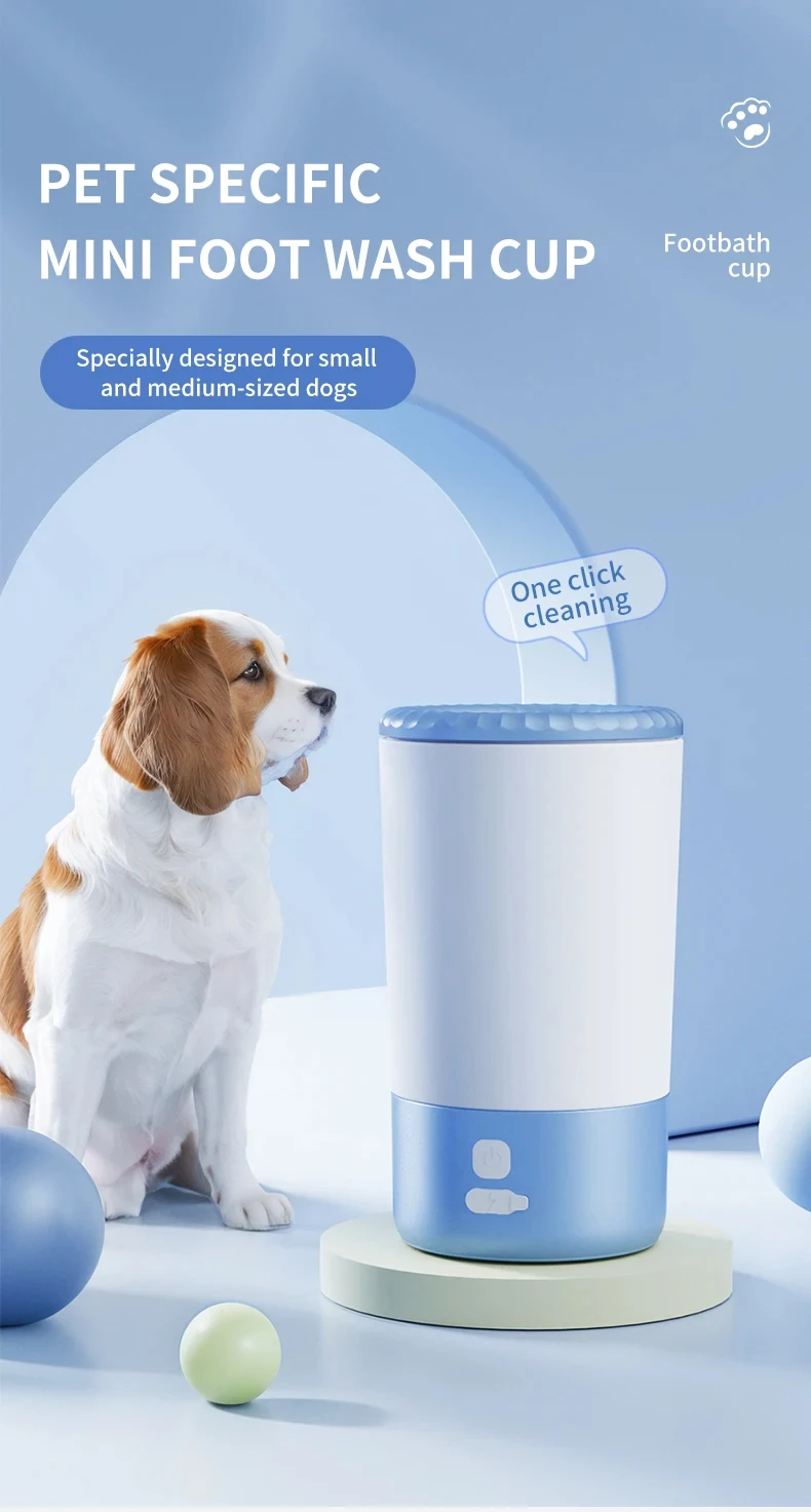 A small brown and white Cavalier King Charles Spaniel sitting next to a blue and white "Mini Foot Wash Cup." A speech bubble next to the device says "One click cleaning," and a banner states it is "Specially designed for small and medium-sized dogs."