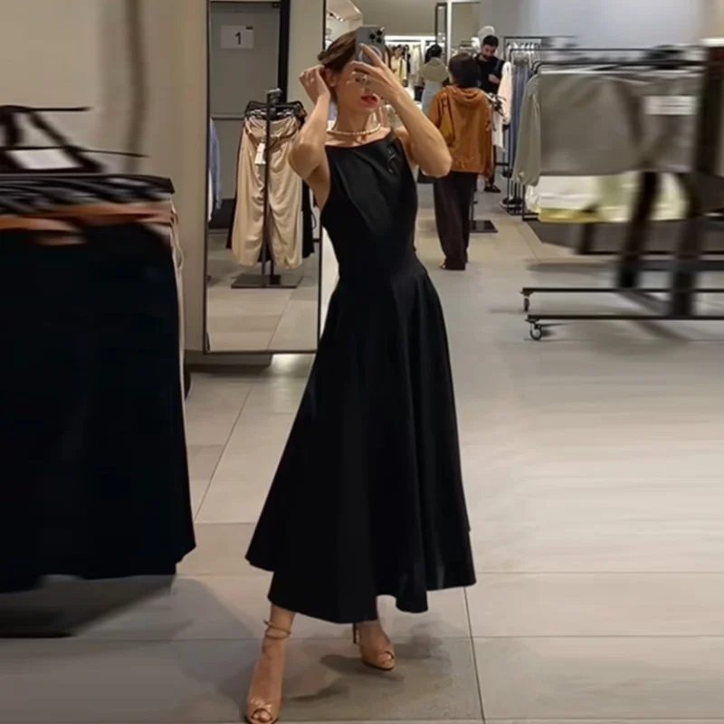 Robe midi noire chic et élégante sans manches coupe trapèze classique pour femme – Tenue intemporelle décontractée et tendance pour l’été et le bureau