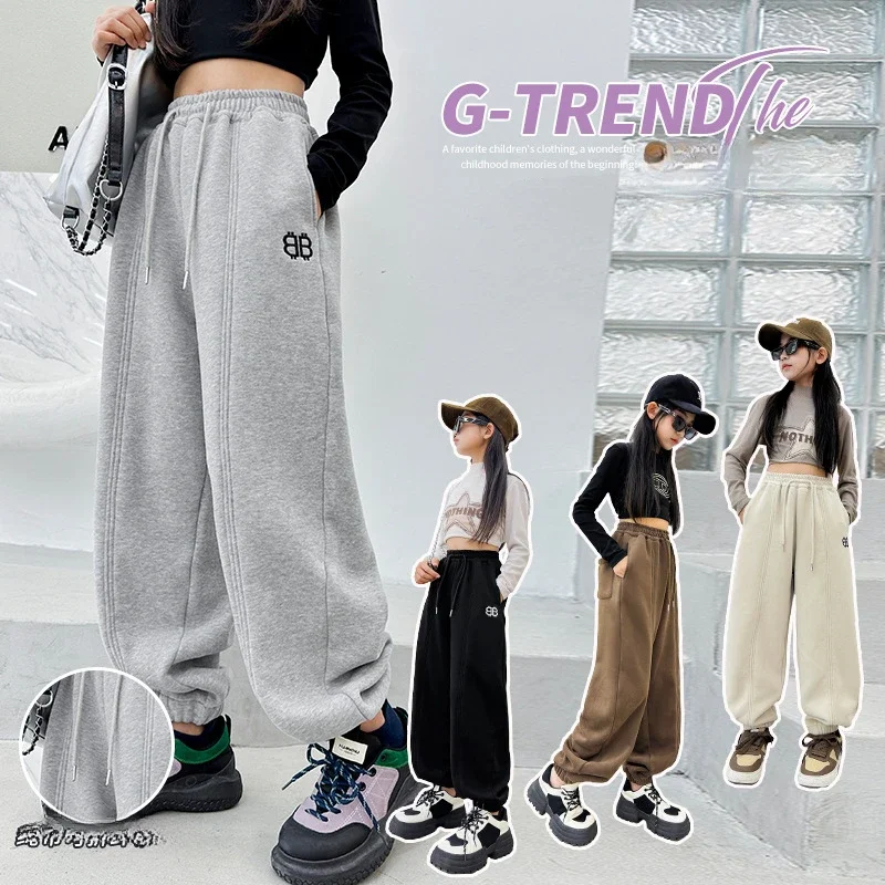 

Girls' plush pants New all-in-one plush sports casual pants 2013 Winter loose and thickened warm and sanitary pants