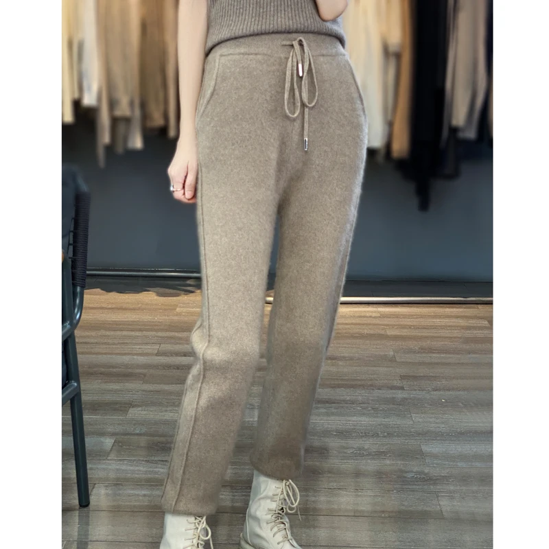 Fashion 100% merino wool cashmere women's knitted wool pants in autumn and winter new elastic waist feet pants.