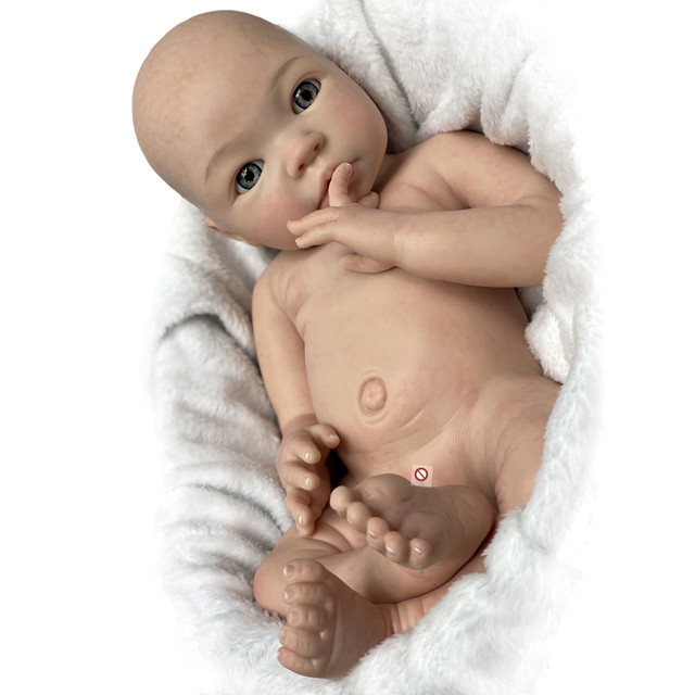 Mini bebê reborn silicone sólido 9cm + bercinho
