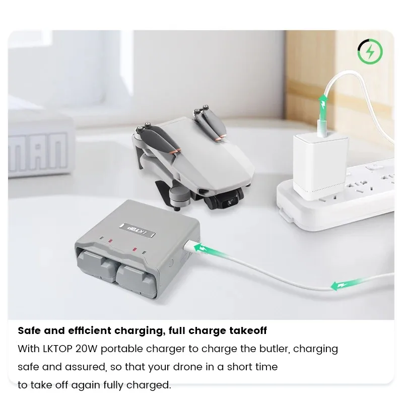 Vue de dessus du hub de charge rapide portable pour DJI Mini, montrant les emplacements pour trois batteries.