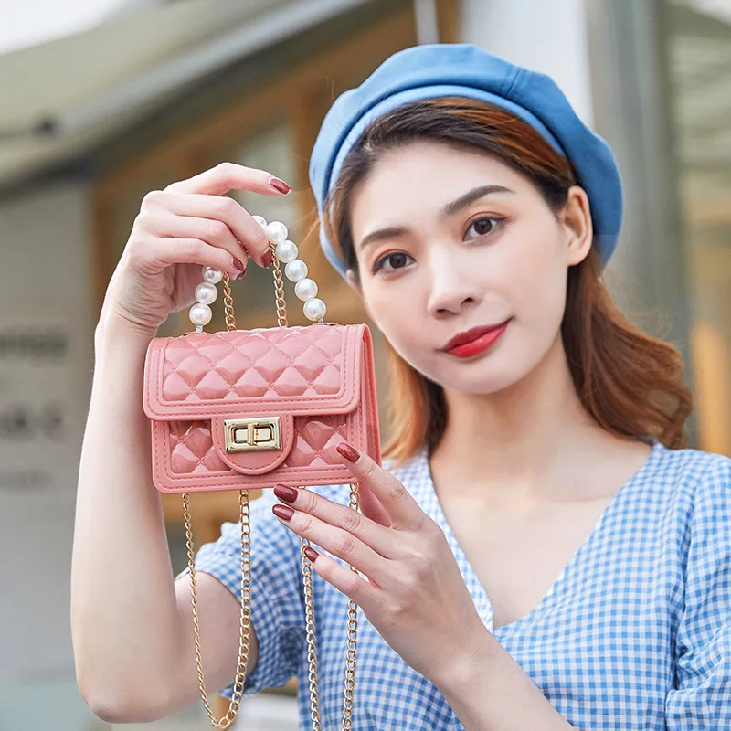 Women's 2023 Ladies Handbag New Pearl Hand Chain Mini Jelly Bag Leisure Mouth Red Bag