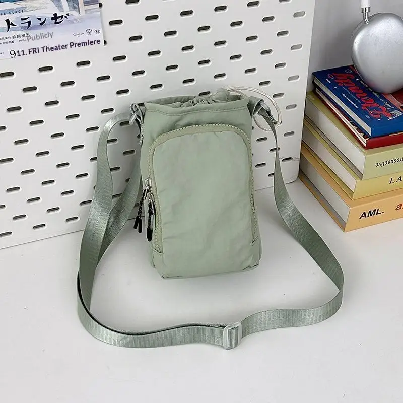 Lightweight Nylon Sling Bag with Adjustable Strap and Zipper Pocket