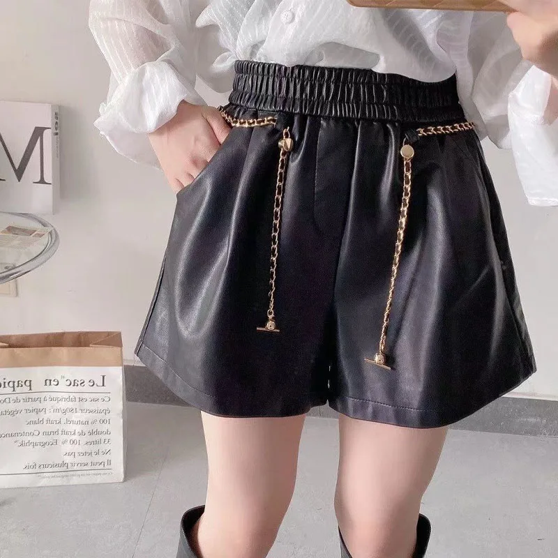 Fashion Korean Solid Leather Shorts Women's Clothing Spring Autumn Loose Wide Leg Chain Patchwork Trend Elastic Waist Pants