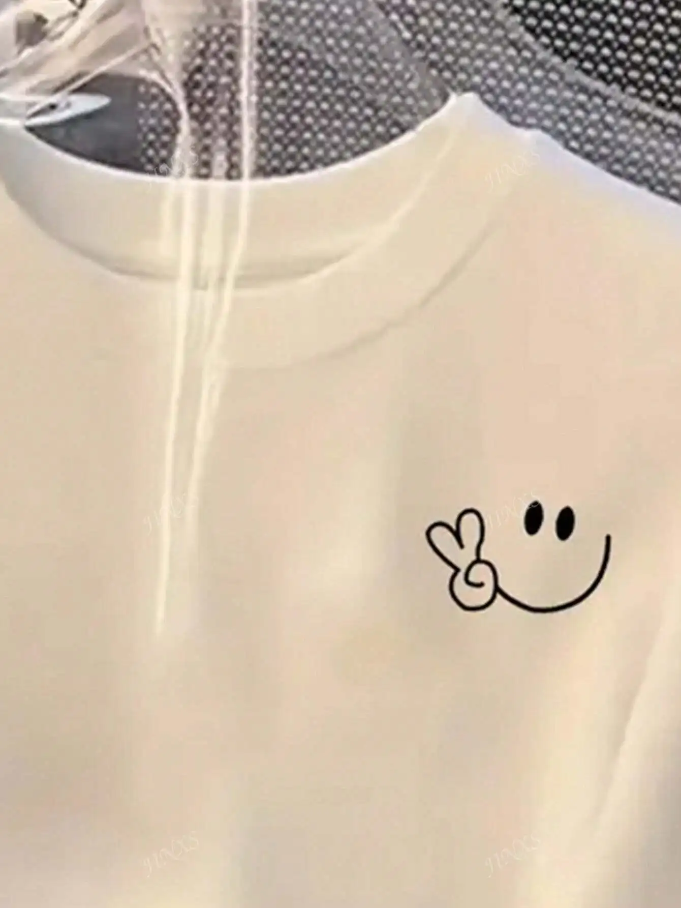 Stylish Tee with Adorable Smile and Peace Sign Design Ideal for Curvy Ladies into Playful Fashion 4