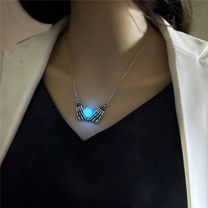 

2022 Moon Glowing Necklace Gem Charm Punk Jewelry Glow in the Dark Skeleton Hand Pendant Hollow Skull Luminous Stone Necklace