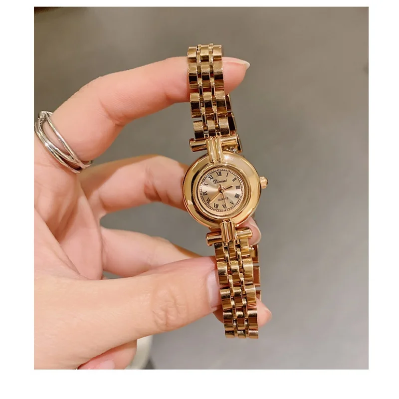 WOMEN'S watches fashion new fashion steel band wristwatch round disk vintage Roman simple quartz watch