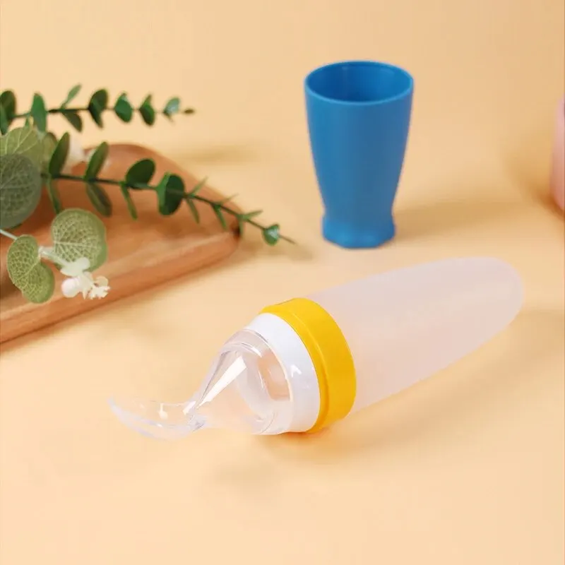 Silicone Feeding Spoon 1 Pcs Baby Rice Cereal Bottle Dropper Squeeze Soft Non Slip Rocket Shape