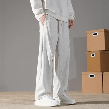 Y2k abbigliamento sportivo 1p Autunno e inverno nuovi pantaloni da uomo pantaloni a gamba dritta da uomo pantaloni sportivi larghi a gamba larga stile Hong Kong 1