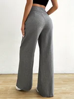 Plus size women's loose fit pants with zipper waist and pleated design featuring fashionable woven fabric - Image 5