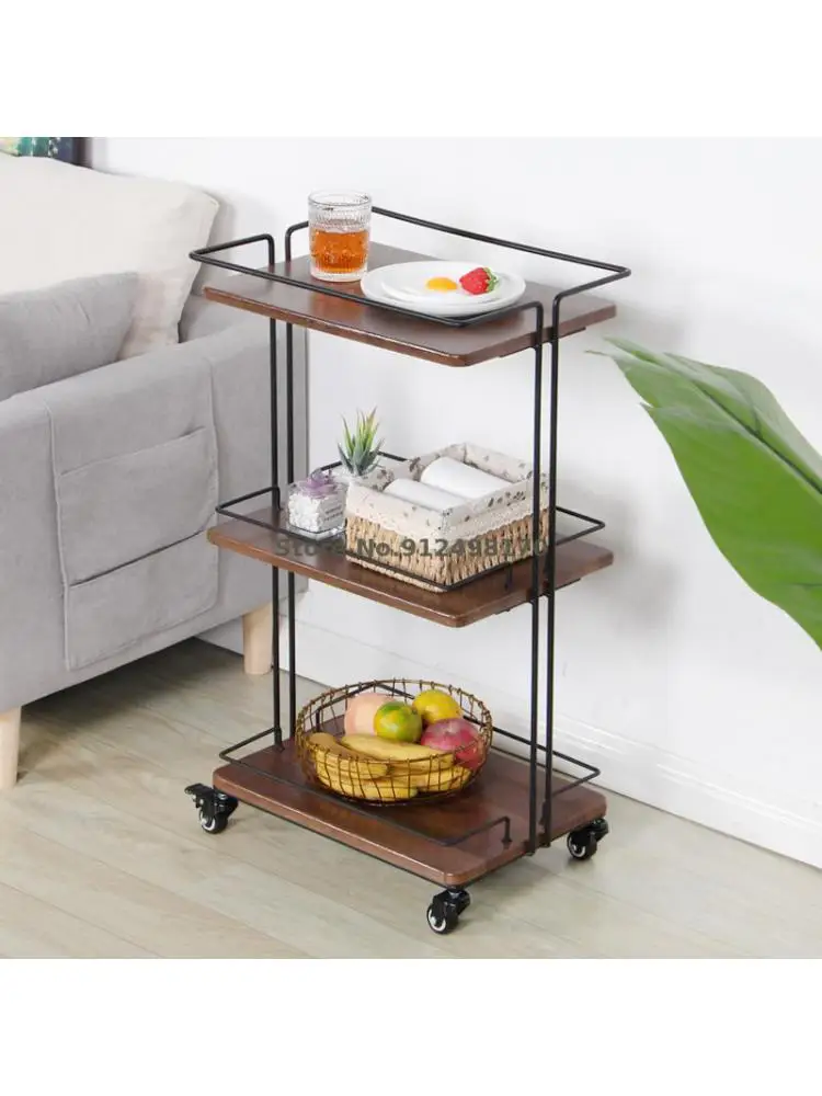 A few corners on the side of a Japanese sofa, a movable iron dining car, multi-layer rack, kitchen storage rack, living