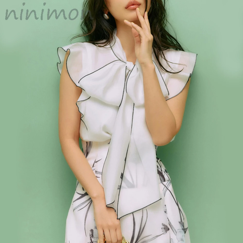 

NINIMON Women Summer Elegant Ruffles Sleeveless Blouse Office Lady Tie Bow Lace Up Chiffon Shirt Vintage Chic Ladies Tops